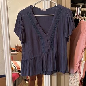 Navy, cropped eyelet blouse.. cropped fit